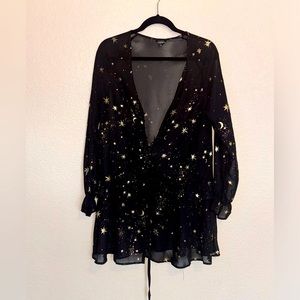 Sheer black top with gold stars